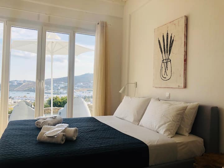 king bedroom - mykonos villa rentals - sun